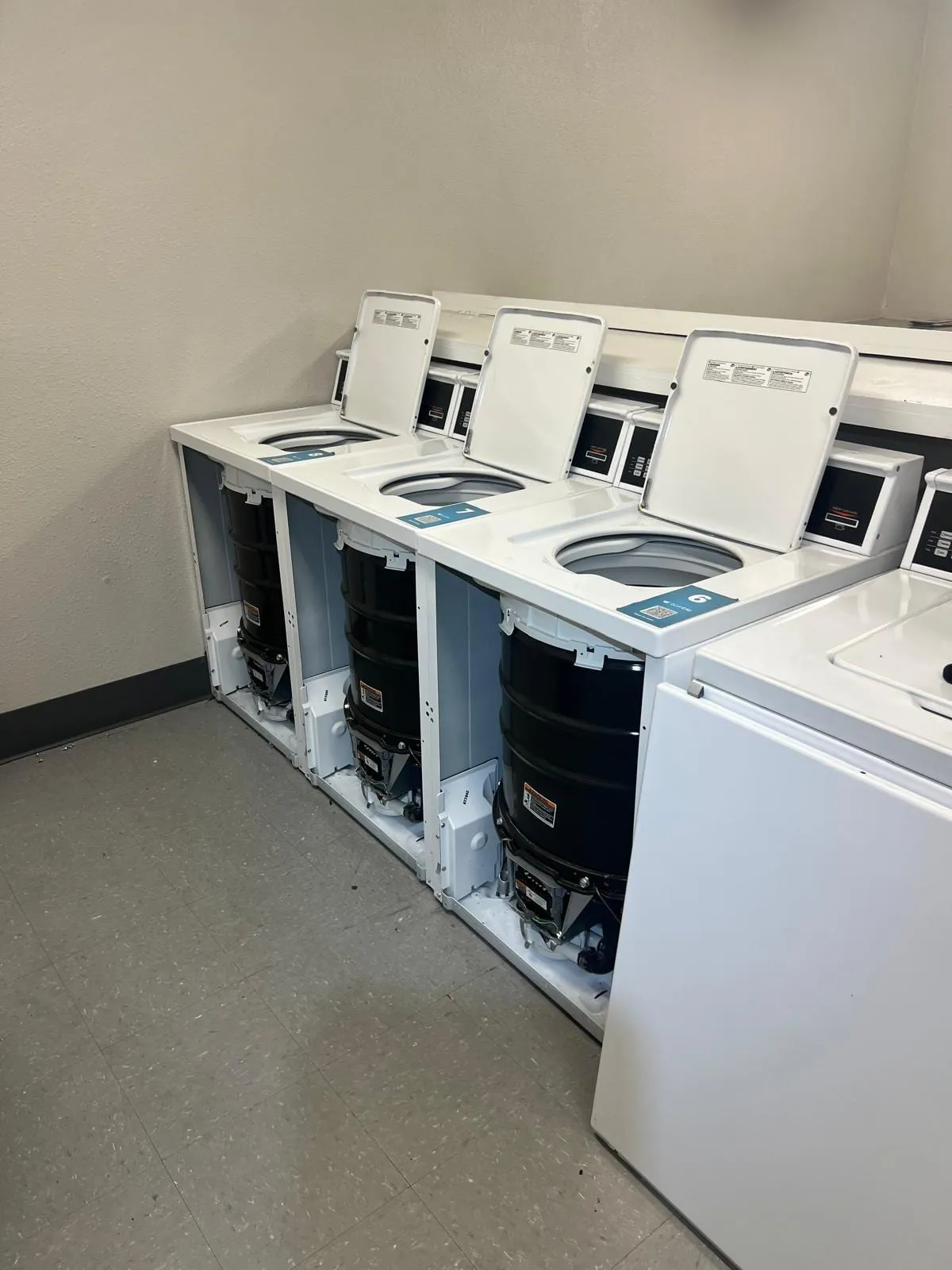 Laundry room washers and dryers, by an Optimal Appliance technician