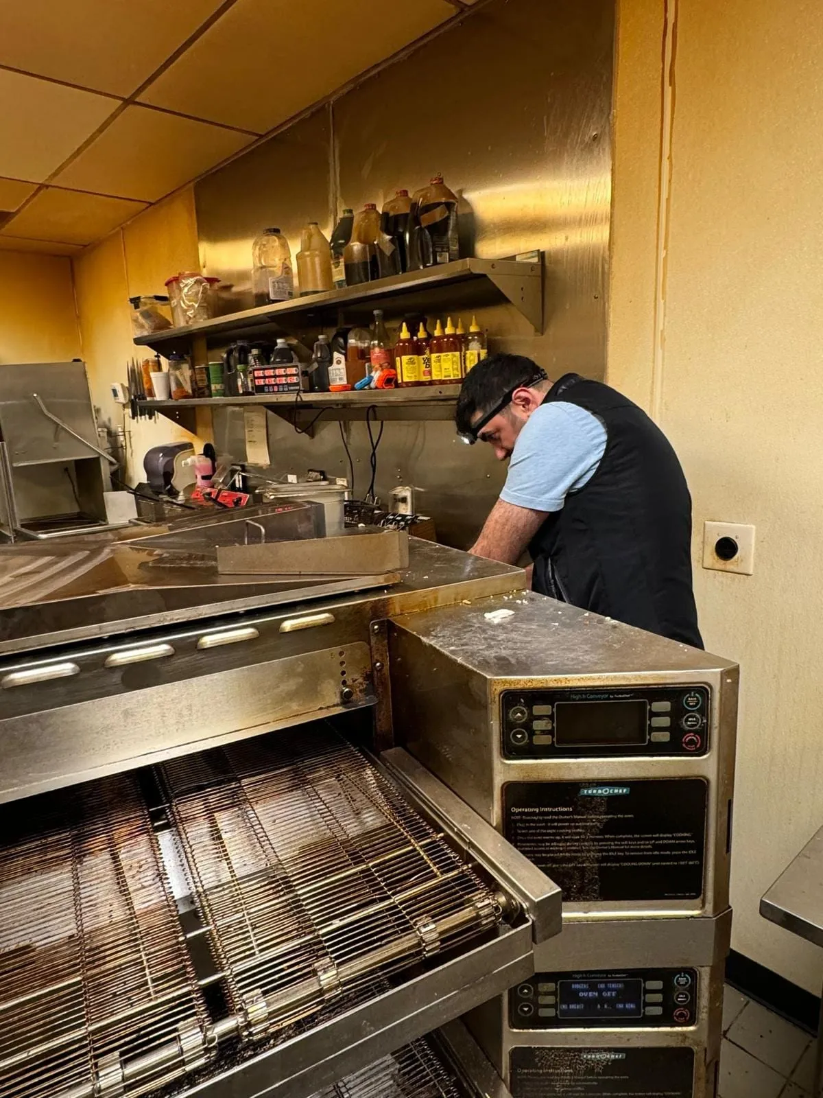 Restaurant oven service, by an Optimal Appliance technician