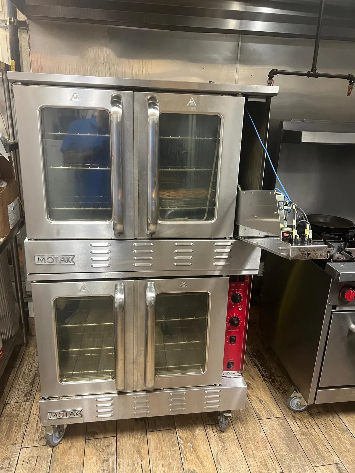 Commercial convection oven, by an Optimal Appliance technician