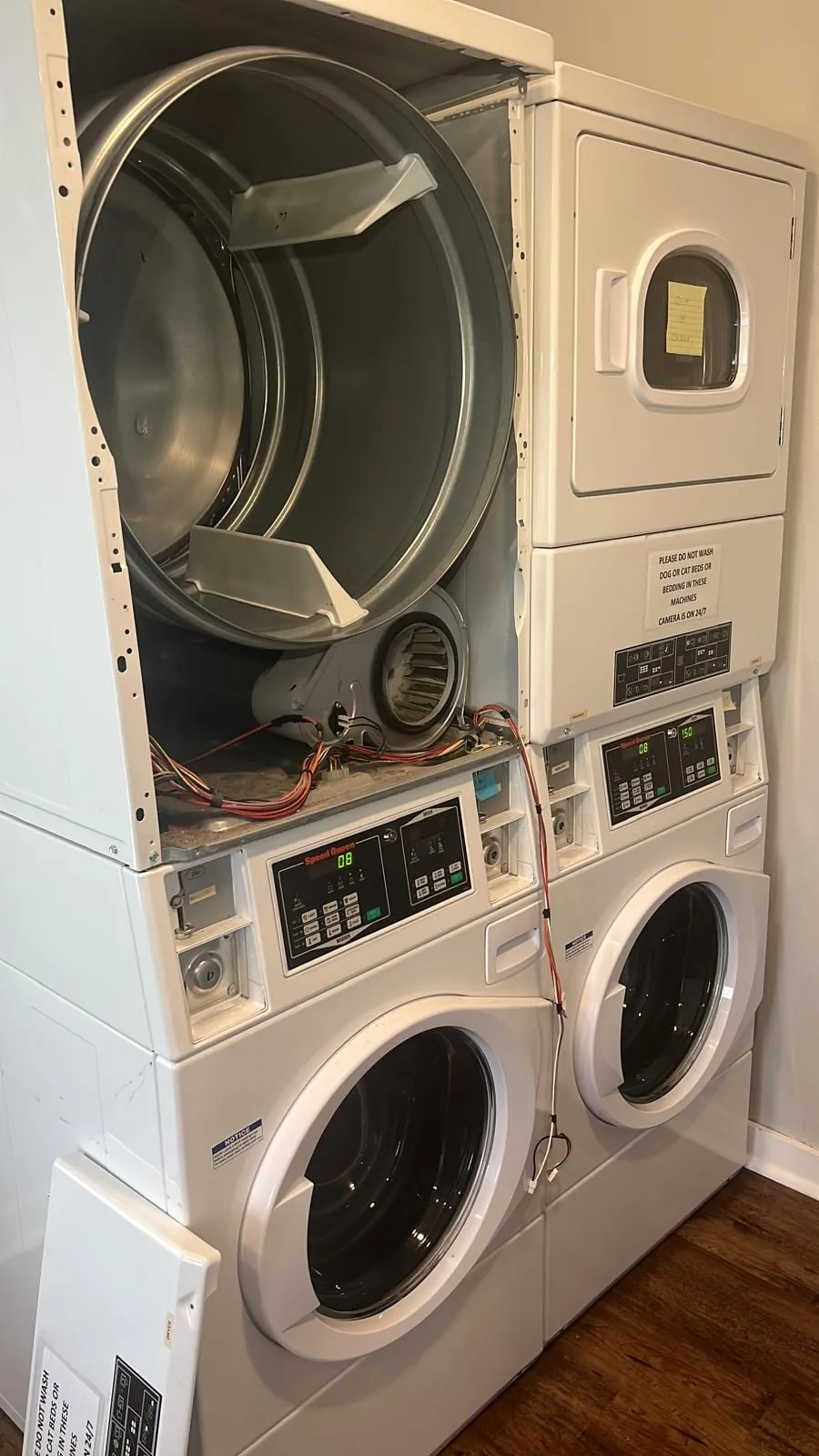 Stacked laundry center repair, by an Optimal Appliance technician