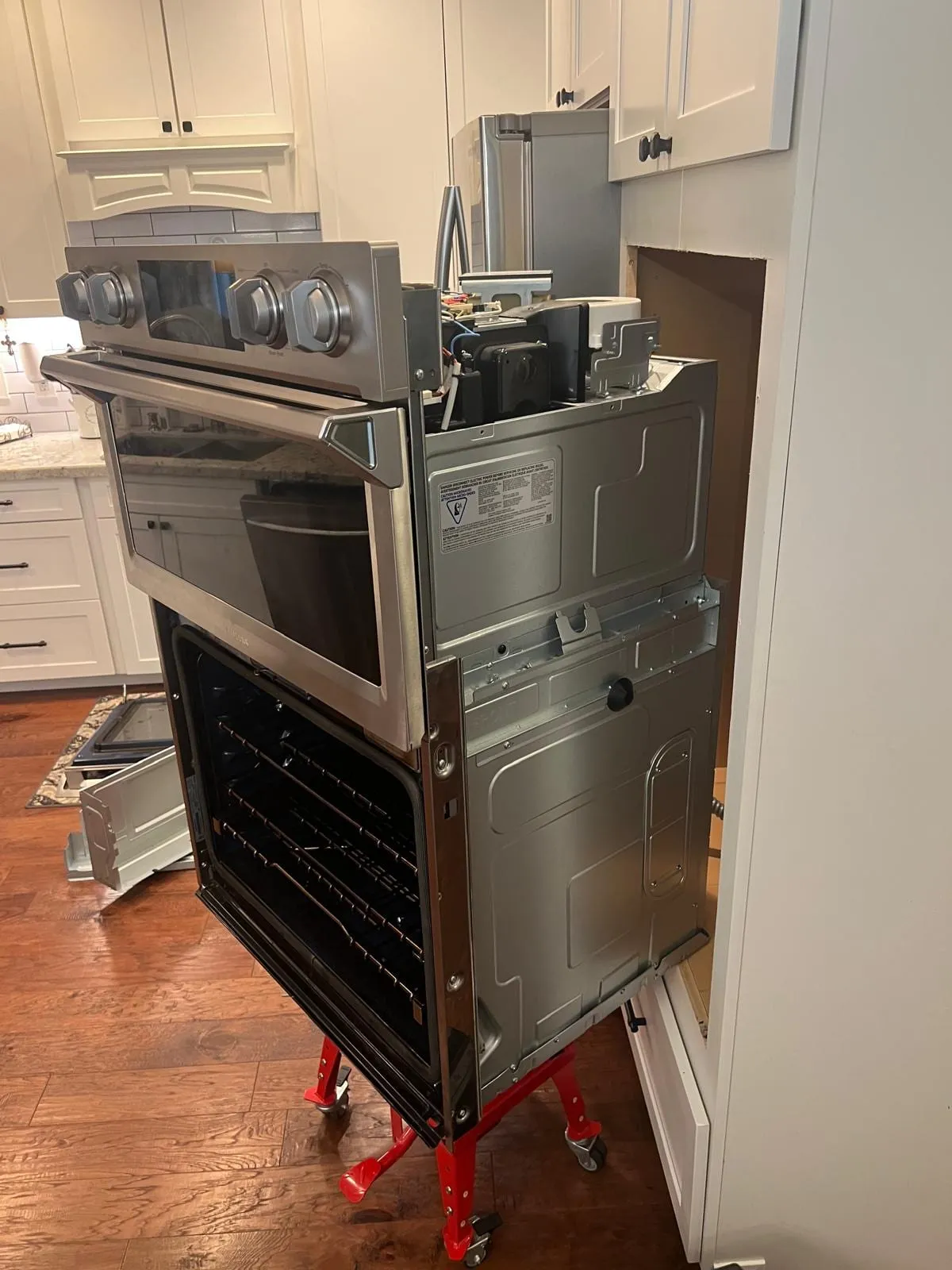 Luxury wall oven repair, by an Optimal Appliance technician