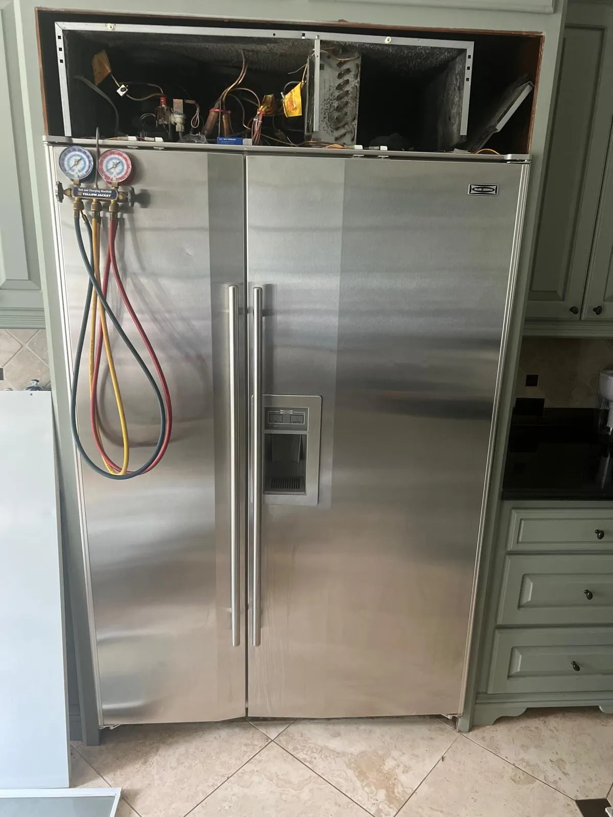 Built-in refrigerator repair, by an Optimal Appliance technician